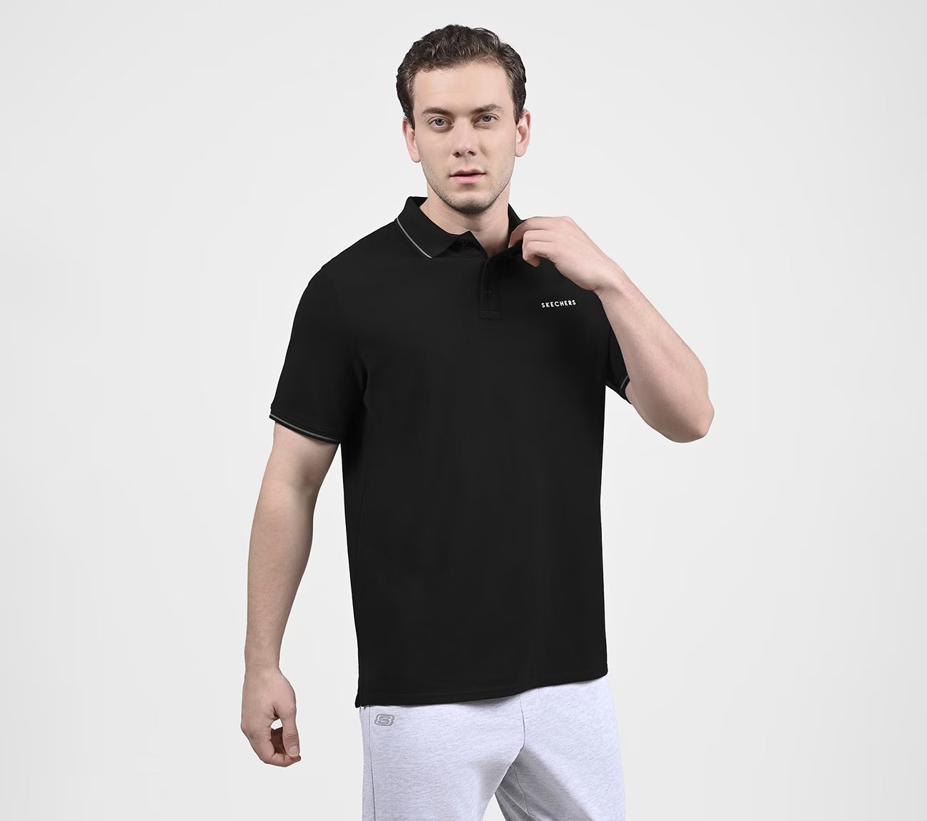 SKECHERS EVERYDAY POLO, BLACK/CHARCOAL/BLUE Apparel Bottom View